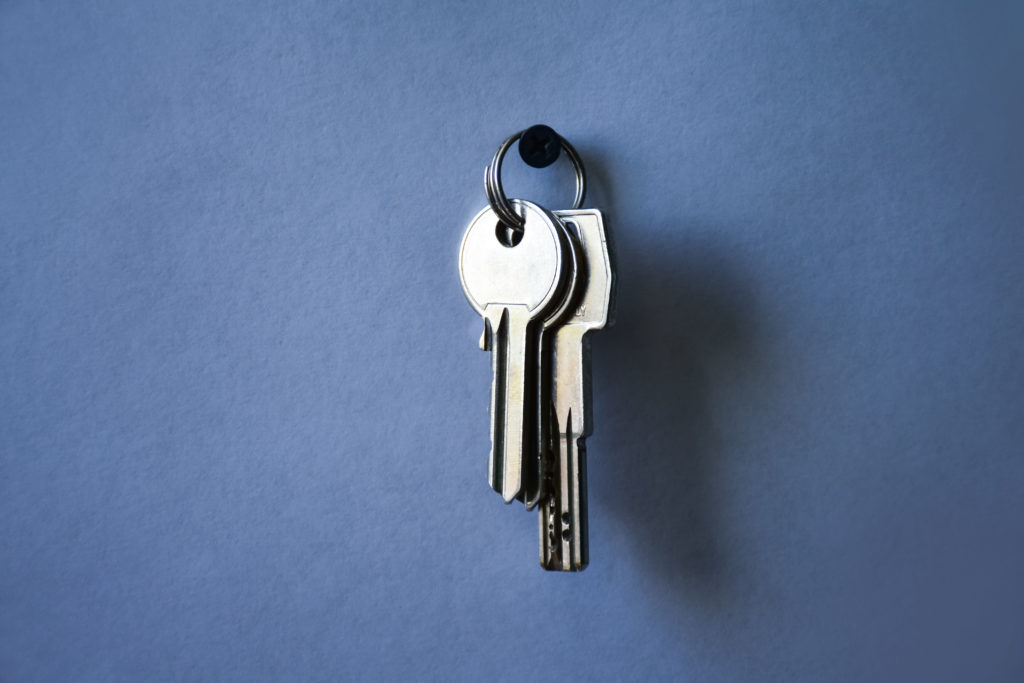 Keys on a keyring hanging on the wall