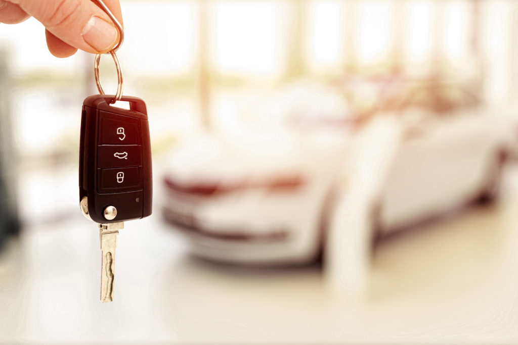 Person holding a laser cut car key