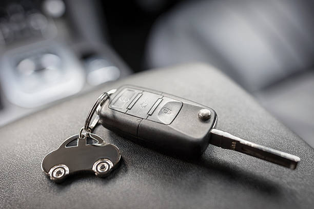 Car shape keyring and remote control key in vehicle interior