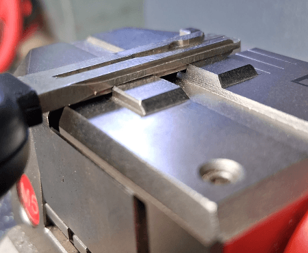 Auto locksmith in Temple TX cutting and programming a replacement car key