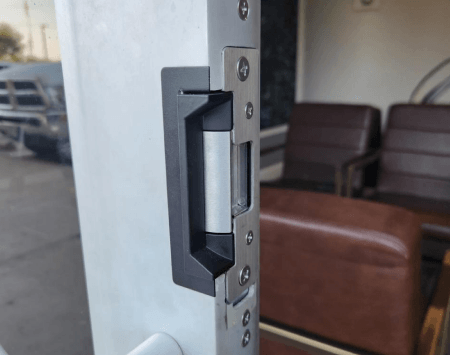 Commercial locksmith in Killeen TX installing electric strike