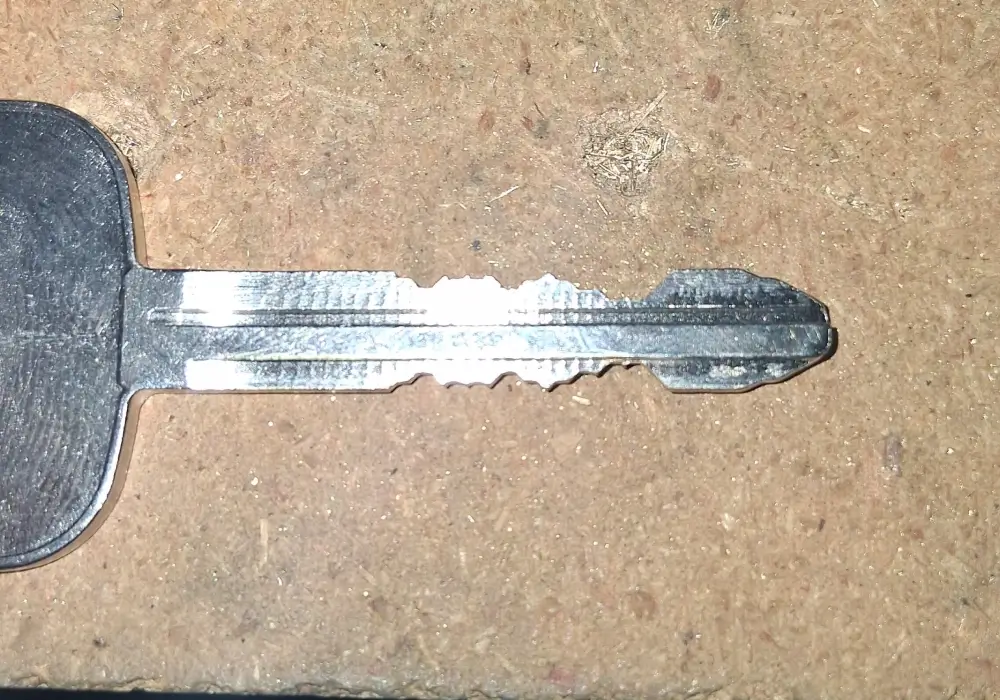 Newly cut car key blade for lost car key replacement