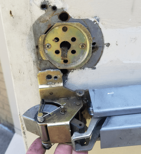 Residential locksmith in Corpus Christi TX repairing door lock
