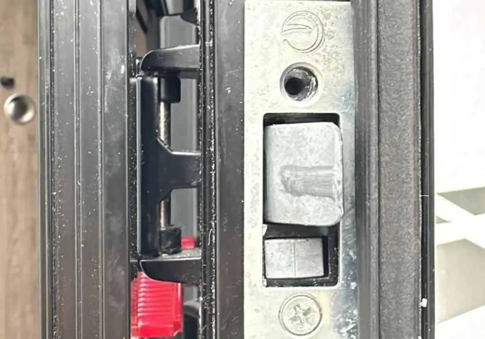 Commercial door strike plate emergency lock repair by Texas Premier Locksm