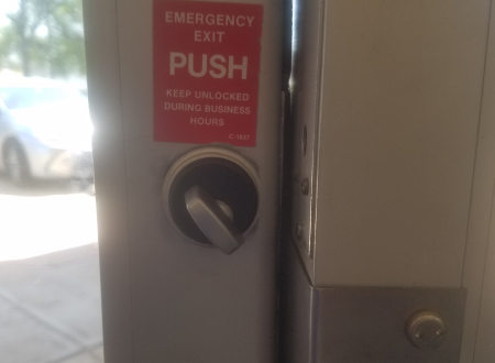 Commercial locksmith in Amarillo, TX servicing an emergency exit door