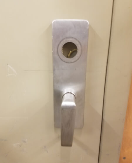 Commercial door lock cylinder replacement Austin TX locksmith