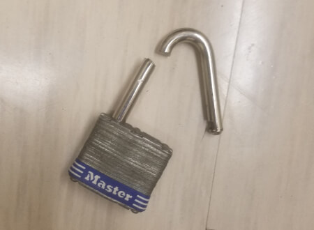 Emergency locksmith in Amarillo, TX working on a Master padlock