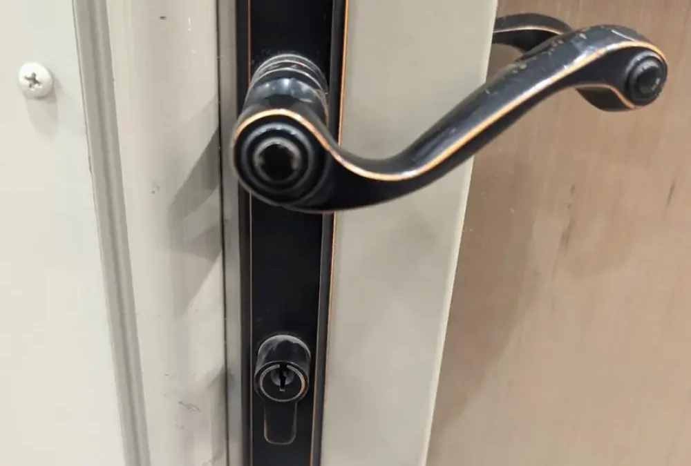 House front door with keyed lock cylinder