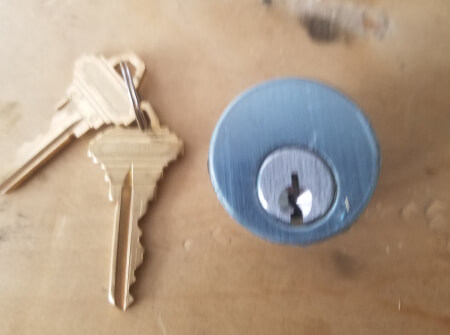 House keys and lock cylinder for residential locksmith service in Dallas, TX