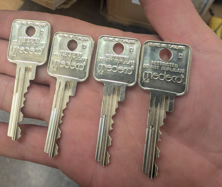 Medeco restricted keyway keys for commercial high security lock installation in Dallas, TX