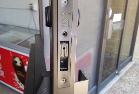 Mortise lock repair on a storefront door in Temple, TX