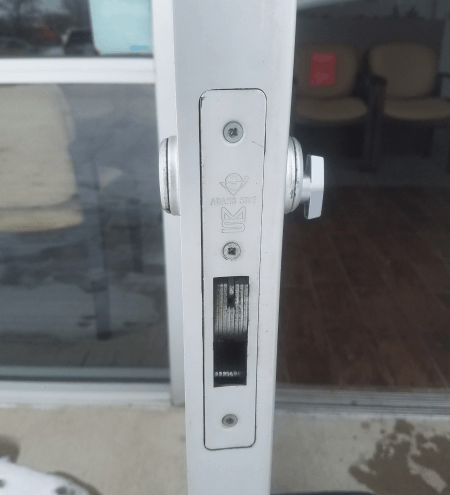 Storefront door lock service commercial locksmith Austin TX