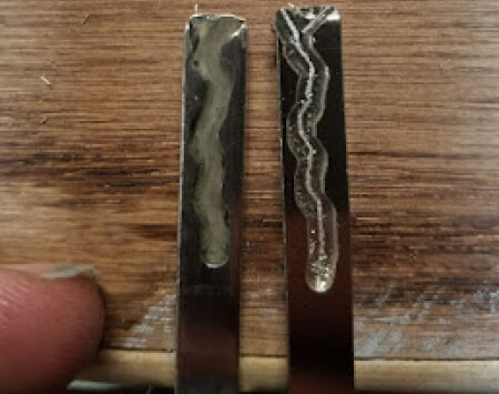Worn and bent car key blades showing damage that leads to key breakage
